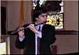 flutist performing in church